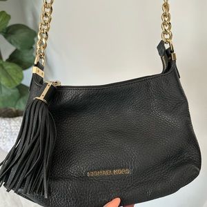 Michael Kors Black Crossbody With Tassels! Gold accents on strap!